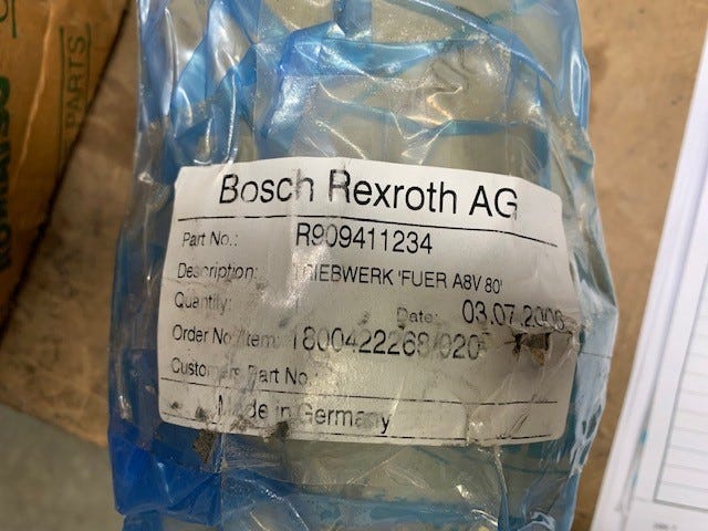 New OEM Genuine John Deere Pump, Part # AT205363