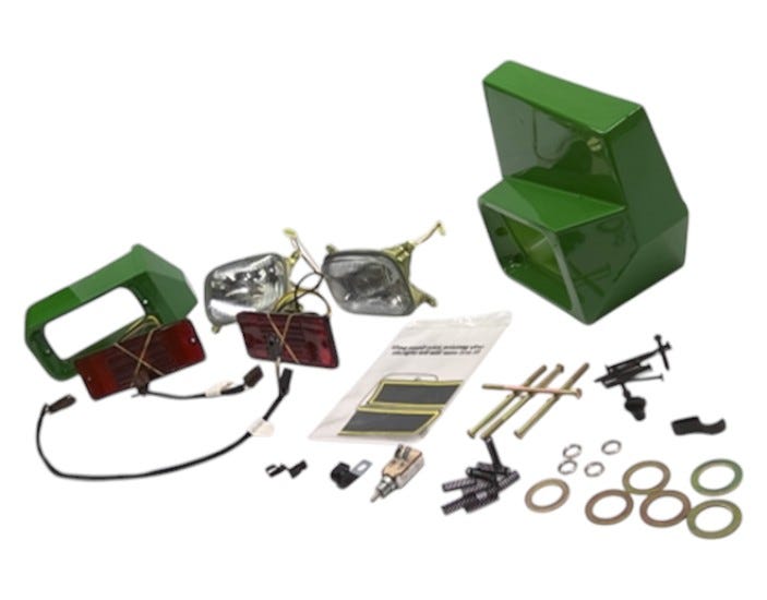 New OEM Genuine John Deere Headlight, Part # AM104286