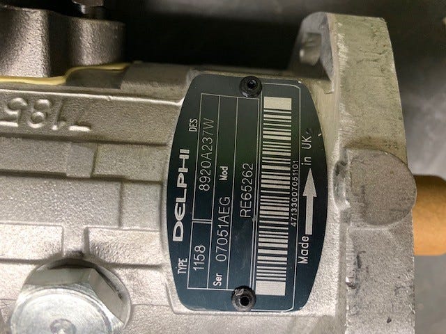 New OEM Genuine John Deere Fuel Injection Pump, Part # RE65262