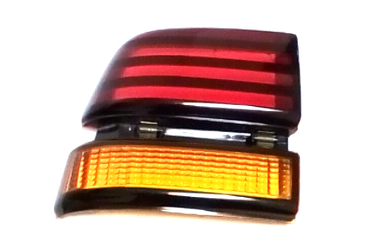 New OEM 1988-1991 Pontiac Sunbird Driver Rear Tail Light, Part # 16508821