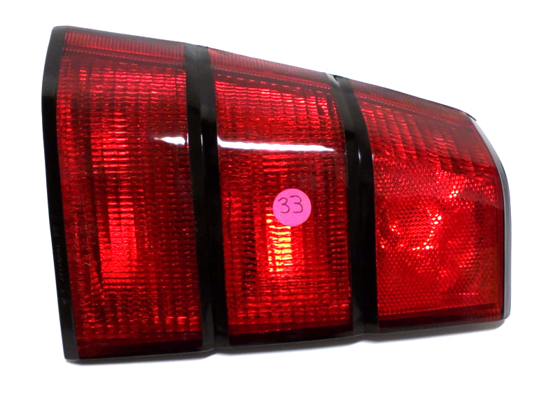 New OEM 1988-1990 Pontiac Lemans Sedan Driver Left Rear Tail Light, Part # 5974311