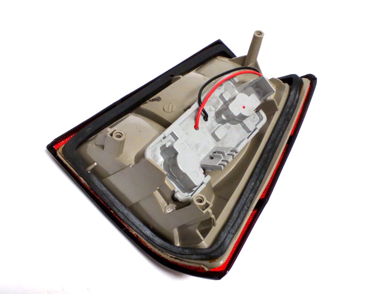 New OEM 1988-1990 Pontiac Lemans Sedan Driver Left Rear Tail Light, Part # 5974311