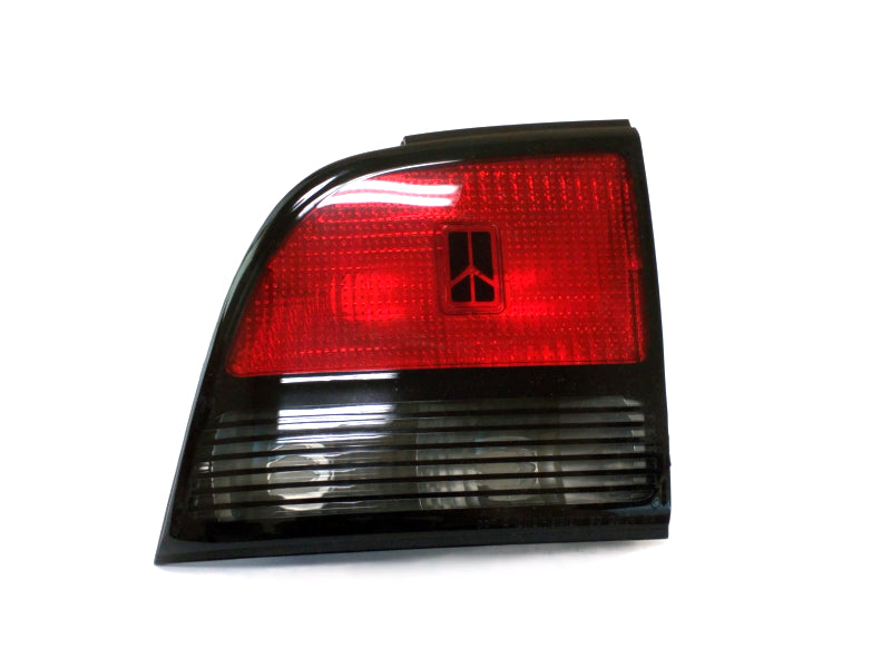New OEM 1990 Oldsmobile Cutlass 4dr Driver's Left Rear Tail Light, Part # 5976565