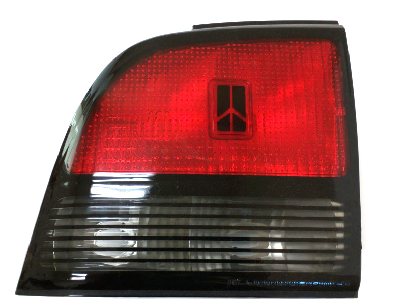 New OEM 1990 Oldsmobile Cutlass 4dr Driver's Left Rear Tail Light, Part # 5976565