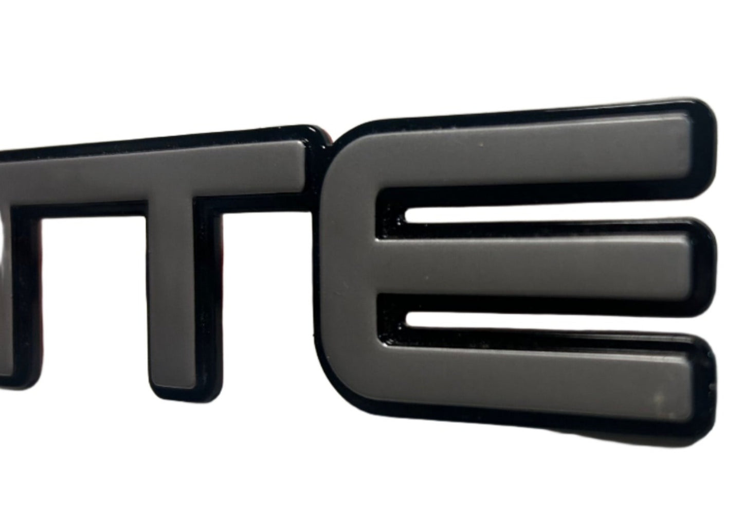 New OEM 1991-1995 Corvette ZR-1 "CORVETTE" Emblem Metallic Gray / Black, Part # 10198741